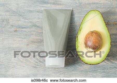 Tube of face mask and avocado View Large Photo Image Stock Image - Tube of face mask and avocado. Fotosearch