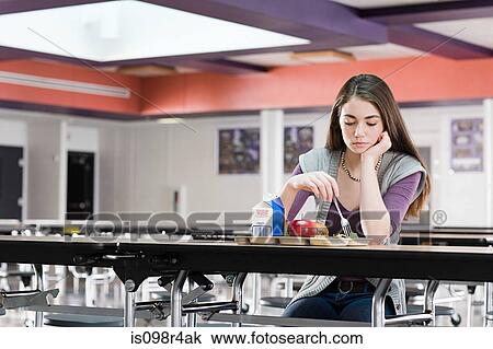 Girl alone at lunch View Large Photo Image Stock Image - Girl alone at lunch. Fotosearch