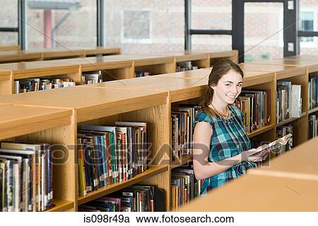 Girl in library View Large Photo Image Stock Image - Girl in library. Fotosearch