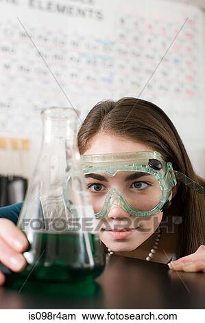 Girl in science class View Large Photo Image Picture - Girl in science class. Fotosearch
