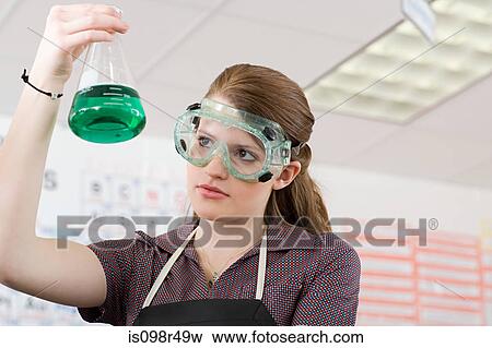 Girl in science class View Large Photo Image Stock Photo - Girl in science class. Fotosearch