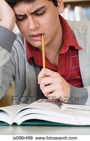 Stock Photo - Student looking confused. Fotosearch