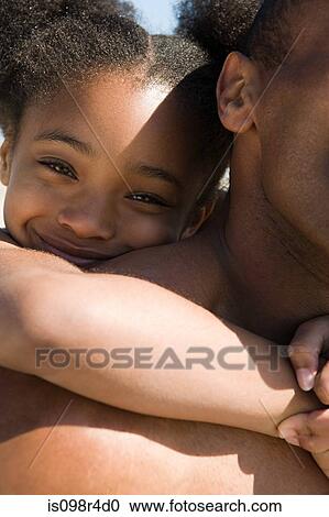 Cute girl hugging her father View Large Photo Image Stock Image - Cute girl hugging her father. Fotosearch