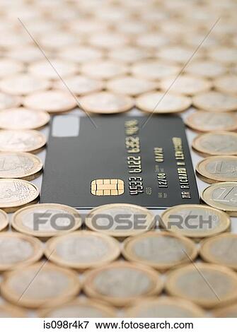 Credit card and euro coins View Large Photo Image Stock Photo - Credit card and euro coins. Fotosearch