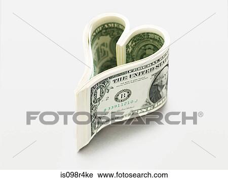 Dollar bills in heart shape View Large Photo Image Stock Image - Dollar bills in heart shape. Fotosearch