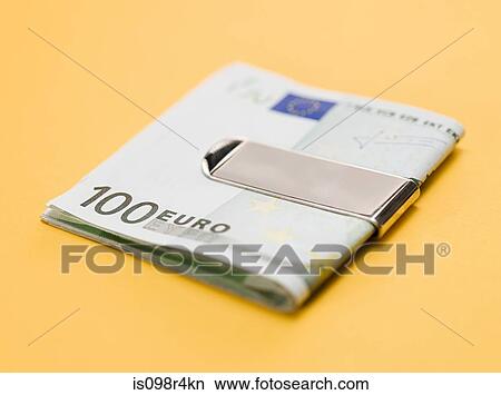 One hundred euro notes in clip View Large Photo Image Picture - One hundred euro notes in clip. Fotosearch