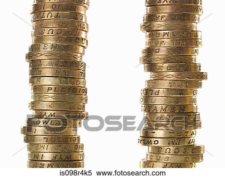Stock Photography - Stacks of one pound coins. Fotosearch