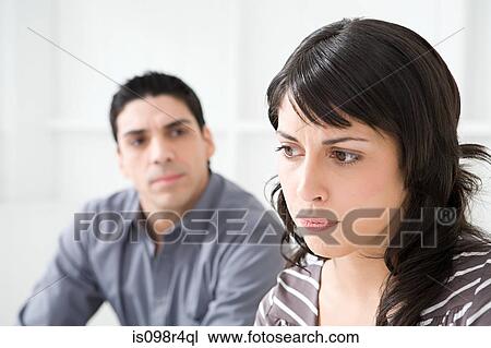 Stock Image - Hostile hispanic couple. Fotosearch