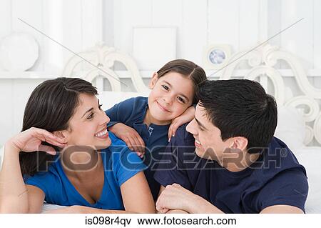 ortrait of hispanic parents and daughter View Large Photo Image Stock Photo - ortrait of hispanic parents and daughter. Fotosearch