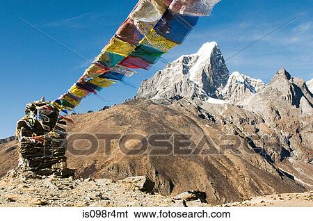 Stock Photograph - Buddhist prayer flags in himalayas. Fotosearch