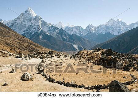 Stock Photo - Burial mounds in himalayas. Fotosearch