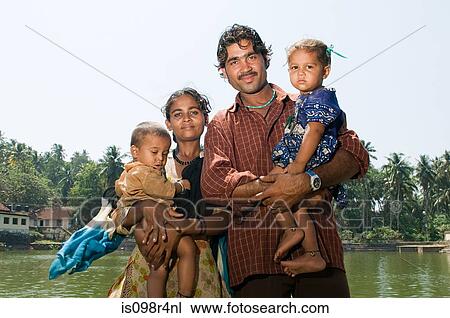 Indian family by communal baths View Large Photo Image Stock Image - Indian family by communal baths. Fotosearch
