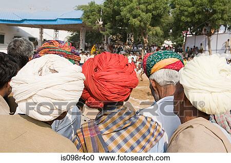 Stock Image - People at pushkar camel festival. Fotosearch