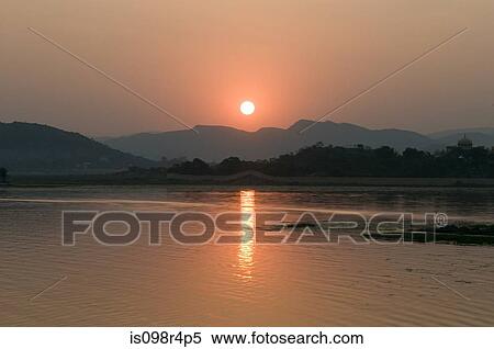 Sunset over lake pichola View Large Photo Image Stock Photography - Sunset over lake pichola. Fotosearch