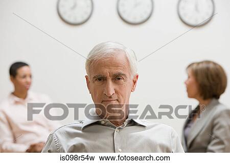 Man and colleagues View Large Photo Image Stock Photo - Man and colleagues. Fotosearch