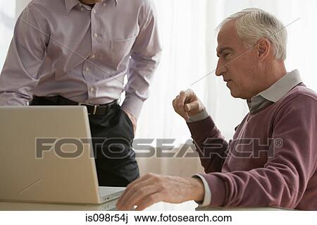 Men in meeting View Large Photo Image Stock Image - Men in meeting. Fotosearch
