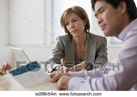 Picture - People in a meeting. Fotosearch