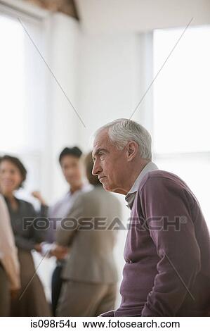 Stock Photograph - Senior man at work. Fotosearch