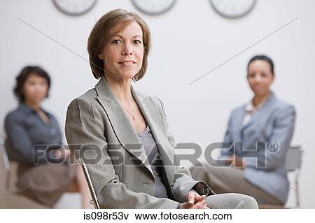 Woman and colleagues View Large Photo Image Stock Photo - Woman and colleagues. Fotosearch