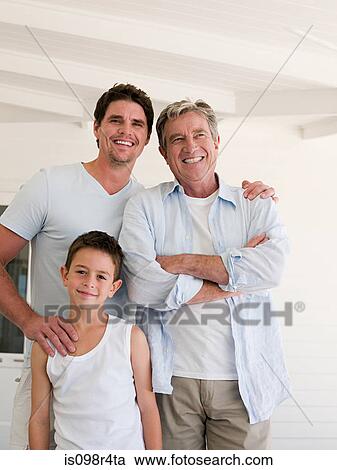 Stock Image - Boy with father and grandfather. Fotosearch