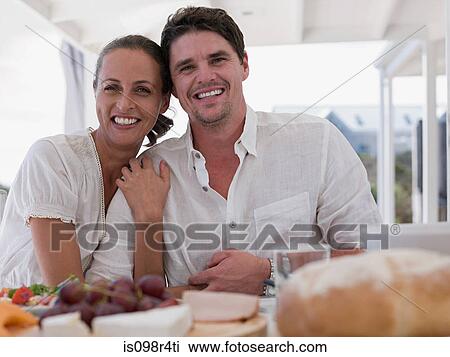 Couple at meal outdoors View Large Photo Image Stock Image - Couple at meal outdoors. Fotosearch