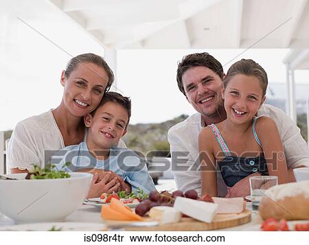 Family meal outdoors View Large Photo Image Stock Photography - Family meal outdoors. Fotosearch