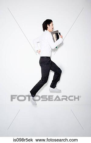 Man jumping View Large Photo Image Stock Image - Man jumping. Fotosearch