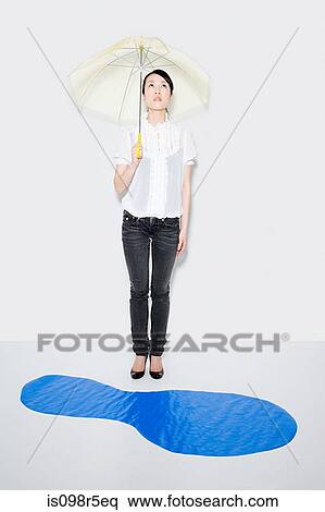 Woman with umbrella View Large Photo Image Stock Photography - Woman with umbrella. Fotosearch