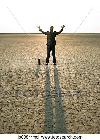 Businessman reaching to the sunlight View Large Photo Image Stock Image - Businessman reaching to the sunlight. Fotosearch