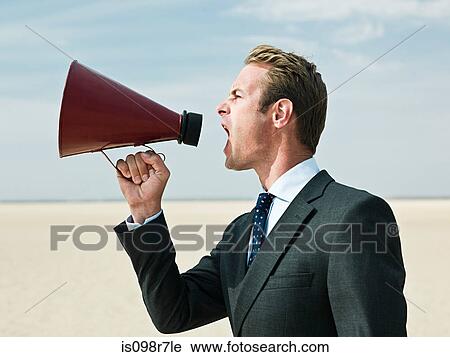 Businessman shouting in the desert View Large Photo Image Stock Image - Businessman shouting in the desert. Fotosearch