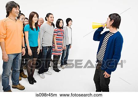 Crowd and man with loudspeaker View Large Photo Image Picture - Crowd and man with loudspeaker. Fotosearch