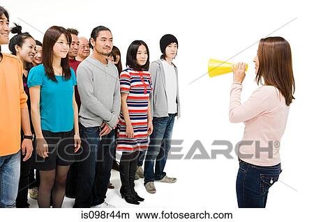 Crowd and woman with loudspeaker View Large Photo Image Picture - Crowd and woman with loudspeaker. Fotosearch