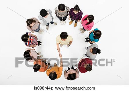 Handshake in circle of people View Large Photo Image Stock Photo - Handshake in circle of people. Fotosearch