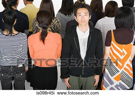 Man in crowd of people View Large Photo Image Stock Image - Man in crowd of people. Fotosearch