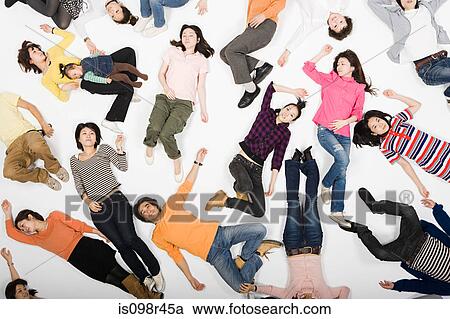 Stock Image - People lying down. Fotosearch