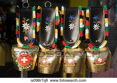 Stock Photo - Four swiss cow bells. Fotosearch