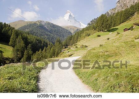 Path through fields and matterhorn View Large Photo Image Stock Photograph - Path through fields and matterhorn. Fotosearch