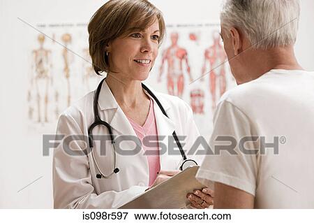 Doctor and patient View Large Photo Image Stock Photo - Doctor and patient. Fotosearch
