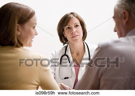 Doctor and patients View Large Photo Image Stock Image - Doctor and patients. Fotosearch