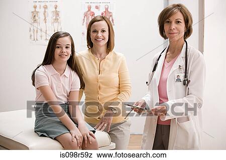 Girl and mother at doctors office View Large Photo Image Stock Photo - Girl and mother at doctors office. Fotosearch