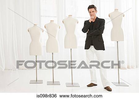 Stock Photograph - Fashion designer and tailors dummies. Fotosearch