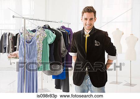 Fashion designer with clothes View Large Photo Image Stock Photography - Fashion designer with clothes. Fotosearch