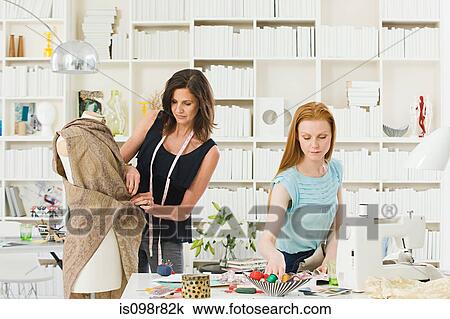 Fashion designers at work View Large Photo Image Stock Image - Fashion designers at work. Fotosearch