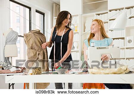 Fashion designers at work View Large Photo Image Stock Image - Fashion designers at work. Fotosearch