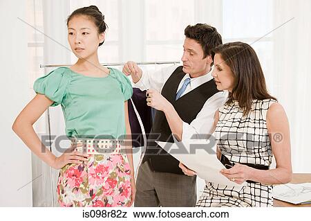 Stock Photo - Fashion designers at work. Fotosearch