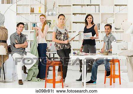 Fashion designers at work View Large Photo Image Stock Photograph - Fashion designers at work. Fotosearch