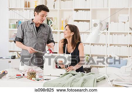 Stock Photography - Fashion designers at work. Fotosearch