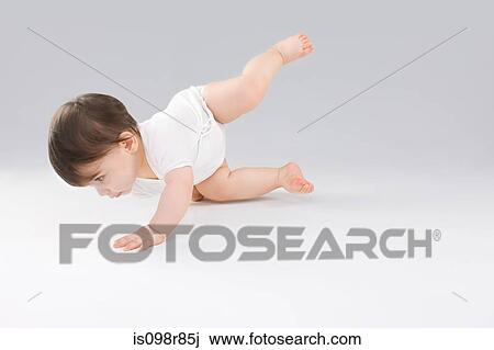 Baby balancing View Large Photo Image Stock Image - Baby balancing. Fotosearch