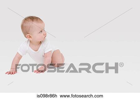Stock Image - Baby crawling. Fotosearch
