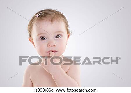 Baby with finger in mouth View Large Photo Image Stock Image - Baby with finger in mouth. Fotosearch